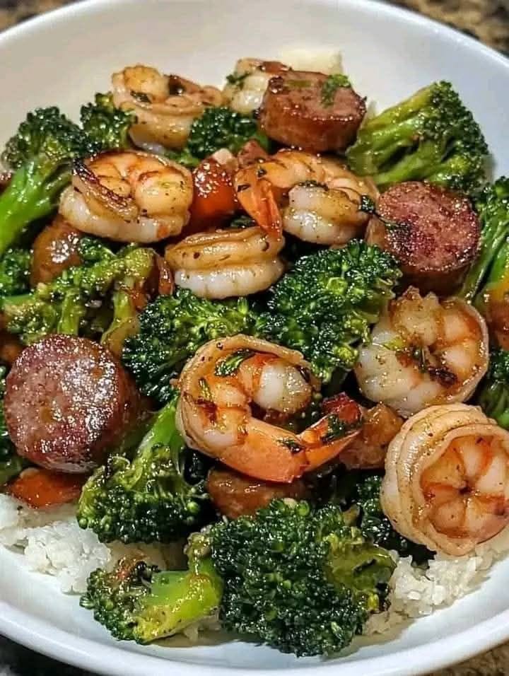 If you're looking for a quick, flavorful, and nutritious meal, look no further than this Spicy Shrimp & Sausage Stir-Fry with Broccoli. Packed with bold spices, succulent shrimp, smoky sausage, and crisp-tender broccoli, this dish is a perfect balance of heat, protein, and greens. Whether you're cooking for yourself or entertaining guests, this easy-to-make stir-fry will impress with its vibrant colors and irresistible taste.