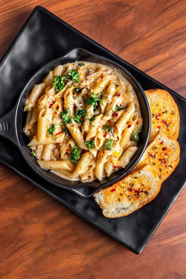 "Discover how to make creamy garlic pasta for under $5 with this easy, budget-friendly recipe. Quick, delicious, and perfect for weeknight dinners!"